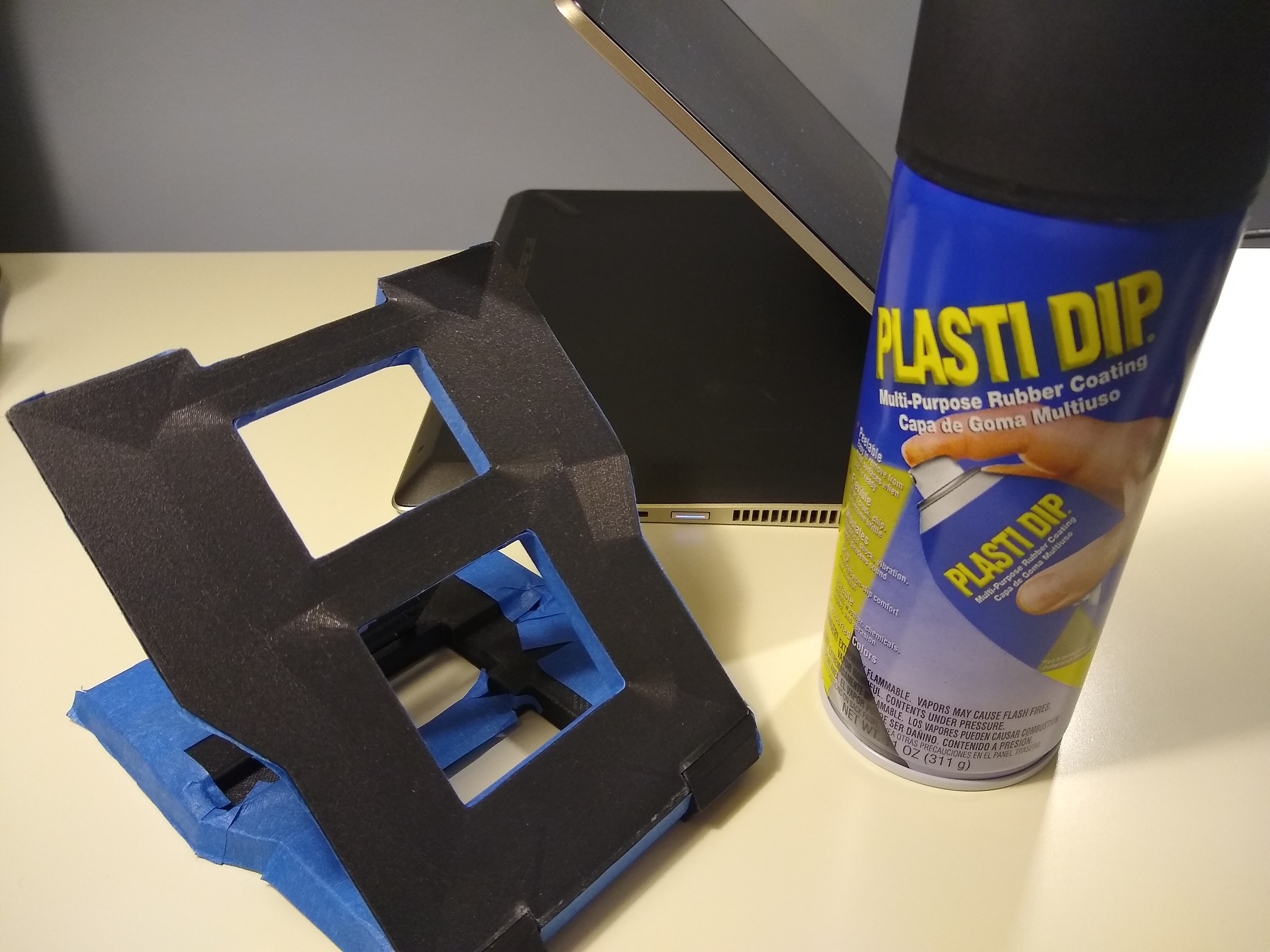 Printed product alongside and ready for the spray-on rubber coating